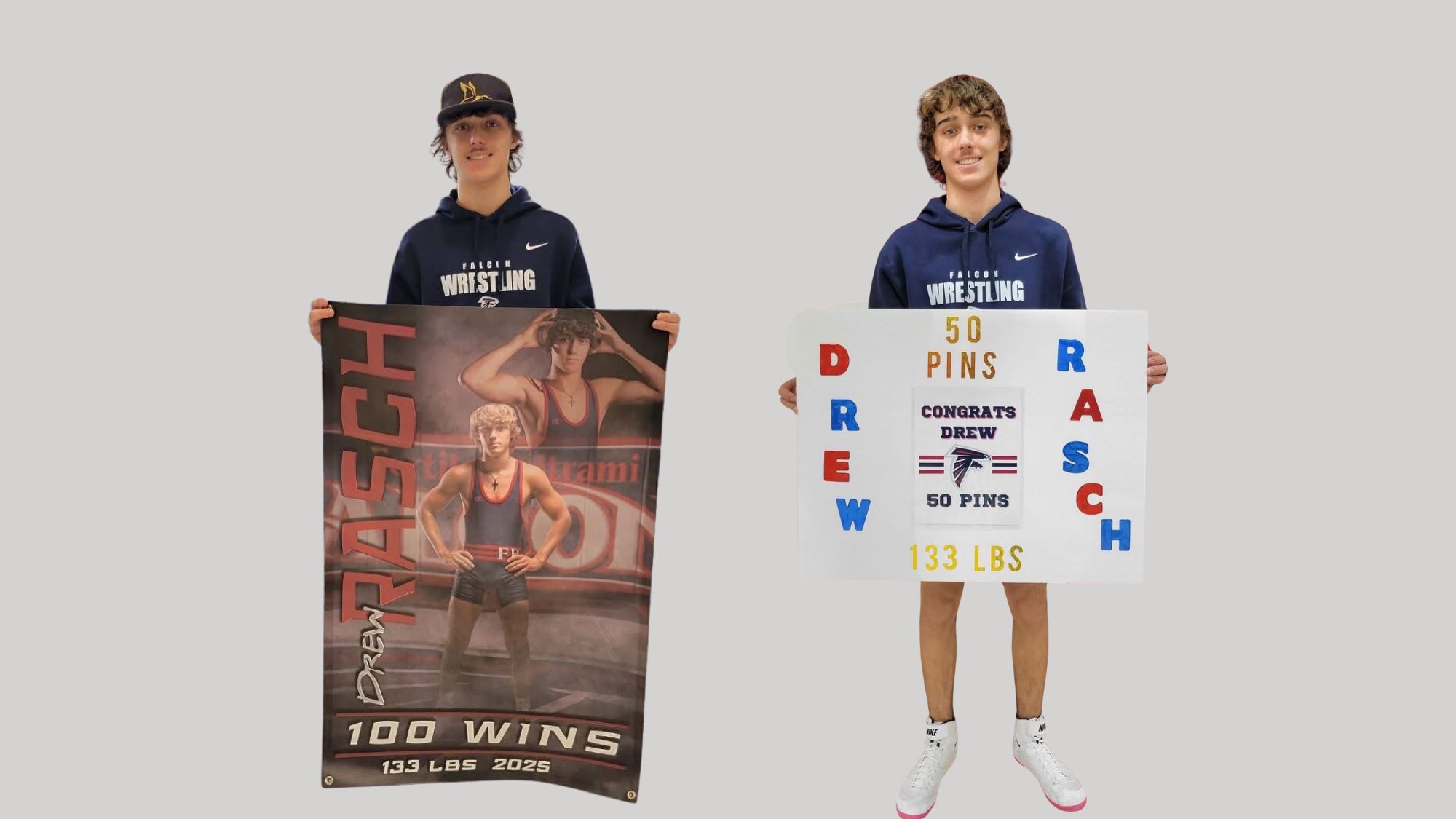 Photo of Drew Rasch holding posters for getting his 100th win and 50th Pin
